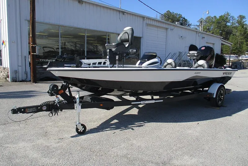 Slide: The Image of 2026 Vexus AVX 1980 boat on trailer outside a dealership. - 5