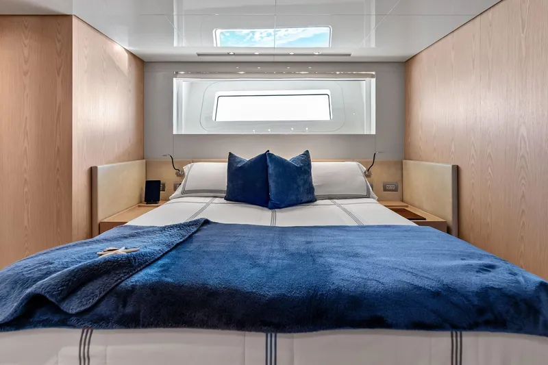 Slide: The Image of Luxurious bedroom interior on 2023 Sanlorenzo SD126 yacht, featuring elegant bedding and modern design. - 22
