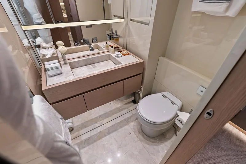 Slide: The Image of Luxurious bathroom in 2023 Sanlorenzo SD126 yacht with modern fixtures and elegant design. - 23