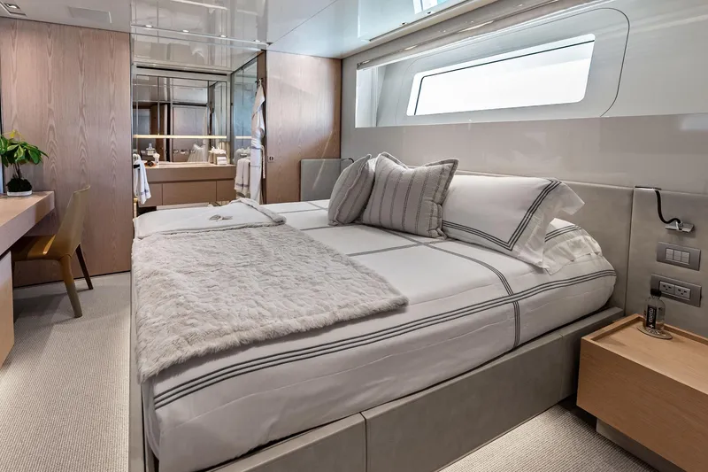 Slide: The Image of Luxurious bedroom interior on 2023 Sanlorenzo SD126 yacht, featuring elegant design and modern amenities. - 25