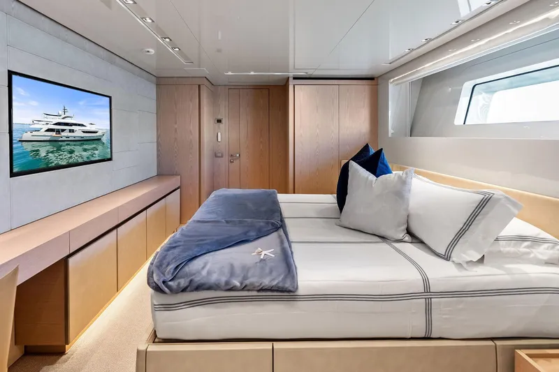 Slide: The Image of Luxurious 2023 Sanlorenzo SD126 yacht bedroom with modern decor and ocean view. - 29