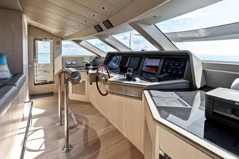 Slide: The Image of Pilothouse of 2023 Sanlorenzo SD126 yacht with modern navigation equipment and panoramic windows. - 34