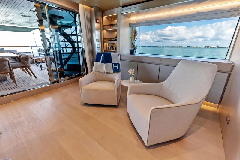 Slide: The Image of Luxurious 2023 Sanlorenzo SD126 yacht interior with elegant seating and ocean view. - 42