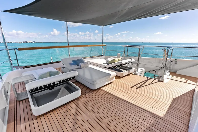 Slide: The Image of Luxurious 2023 Sanlorenzo SD126 yacht deck with sun loungers and ocean view. - 46