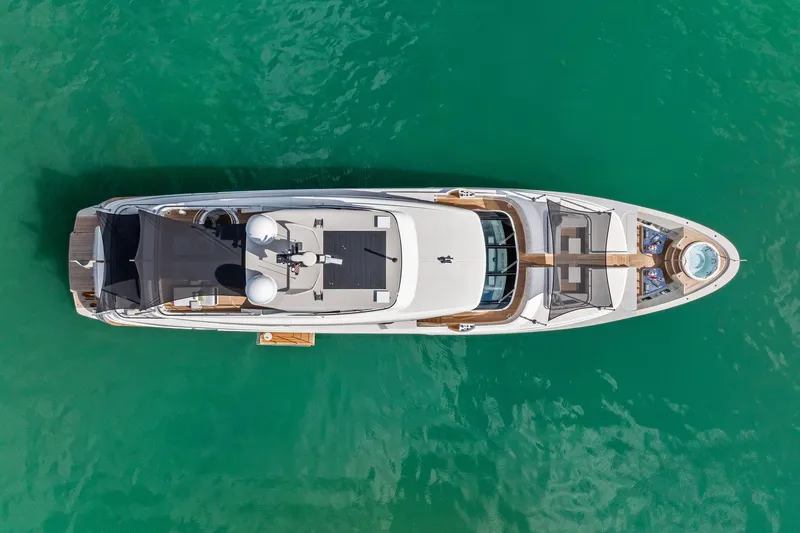 Slide: The Image of Aerial view of 2023 Sanlorenzo SD126 yacht on turquoise water. - 63