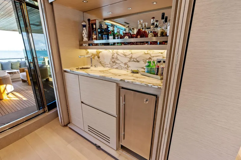 Slide: The Image of Luxurious 2023 Sanlorenzo SD126 yacht interior with elegant marble bar and ocean view. - 7