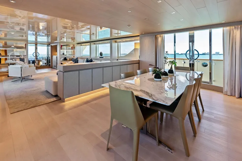 Slide: The Image of Luxurious interior of 2023 Sanlorenzo SD126 yacht with elegant dining area and panoramic views. - 9