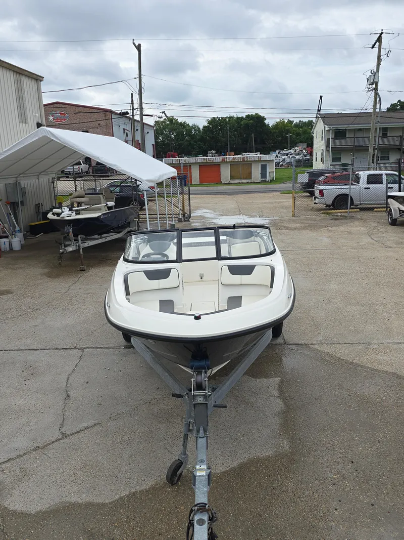 Slide: The Image of 2018 Bayliner VR4 Bowrider I/O on trailer in outdoor storage area. - 11