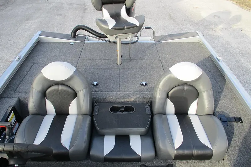 Slide: The Image of 2026 Vexus Defender 189 boat interior with three cushioned seats and a central console. - 11