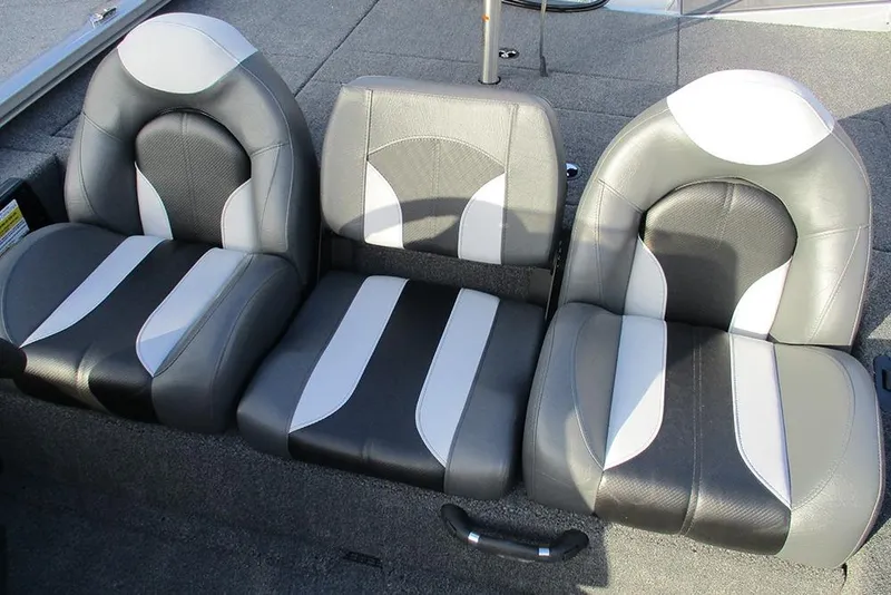 Slide: The Image of 2026 Vexus Defender 189 boat seats, featuring sleek black and white design. - 12