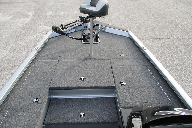 Slide: The Image of 2026 Vexus Defender 189 boat deck with seating and storage compartments. - 4