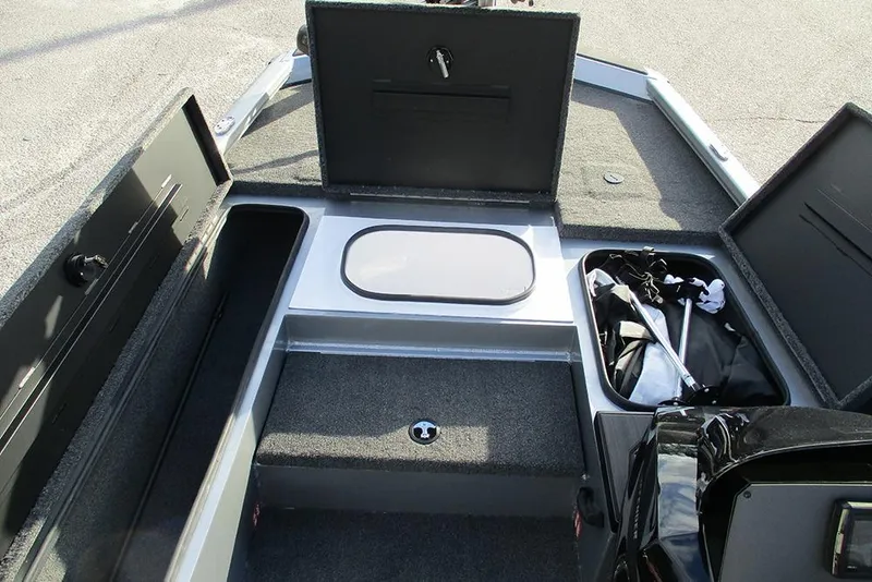 Slide: The Image of 2026 Vexus Defender 189 boat interior with storage compartments and equipment. - 5