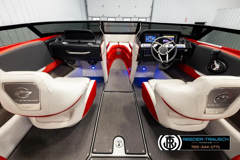 Slide: The Image of Interior of 2022 Crownline 220 LPX boat with modern dashboard and seating. - 14