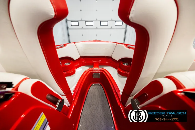 Slide: The Image of Interior of 2022 Crownline 220 LPX boat with red and white seating. - 16