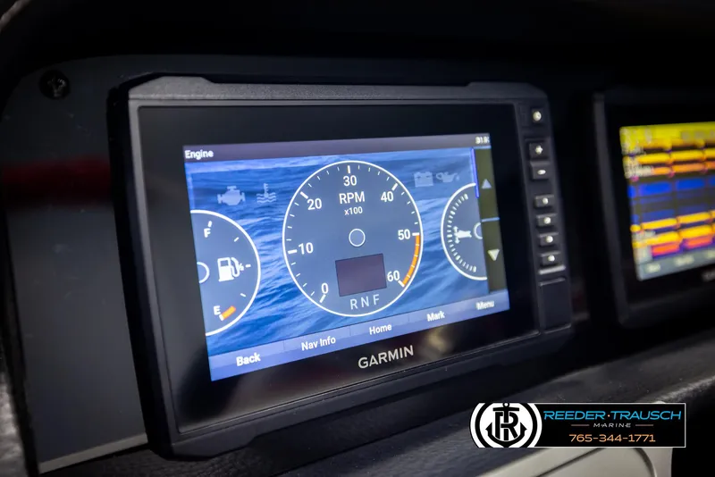 Slide: The Image of Garmin display on 2022 Crownline 220 LPX boat dashboard, showing engine RPM and fuel gauge. - 30