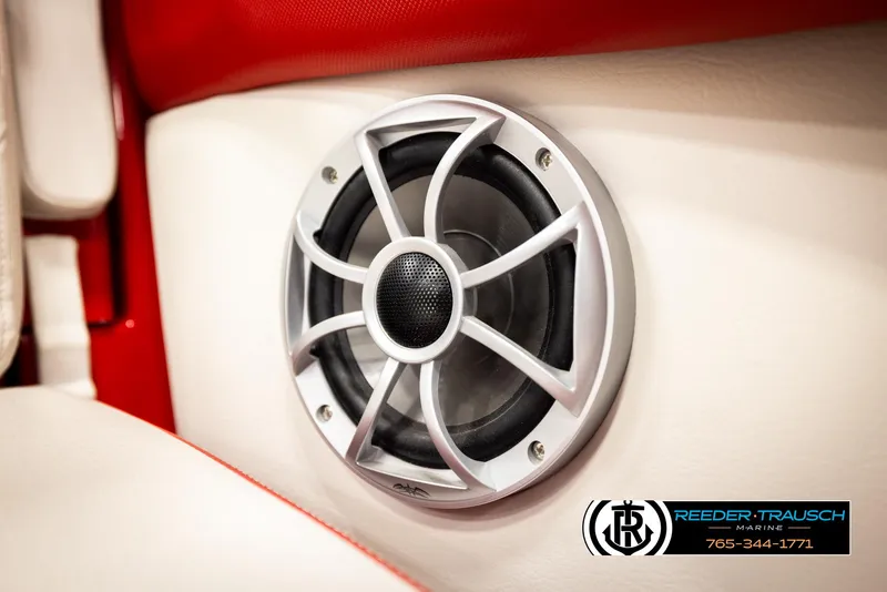 Slide: The Image of Speaker detail in 2022 Crownline 220 LPX boat interior with red and white upholstery. - 36