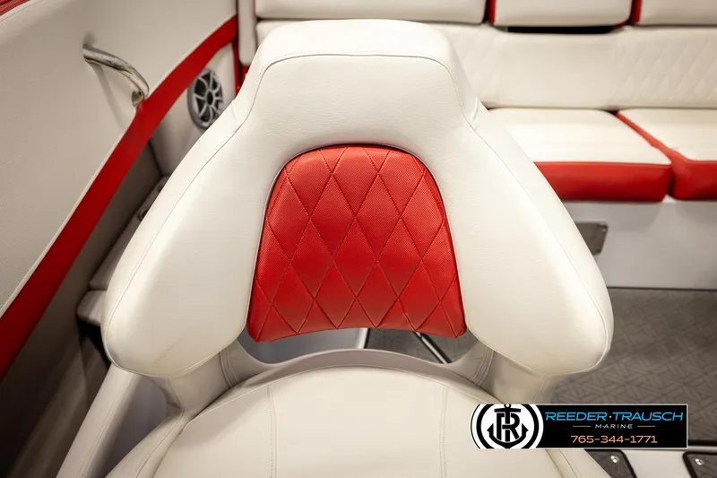 Slide: The Image of Red and white interior of 2022 Crownline 220 LPX boat, featuring diamond-stitched seating. - 38