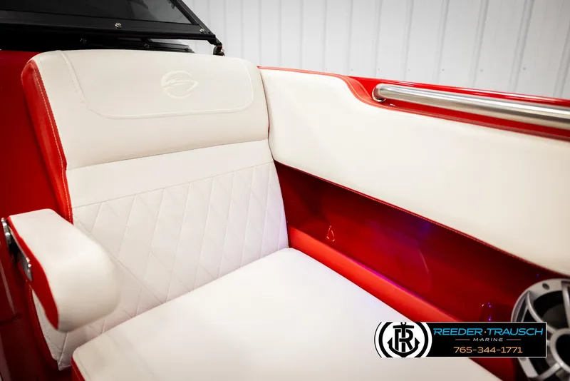 Slide: The Image of Red and white interior of 2022 Crownline 220 LPX boat, featuring luxurious seating. - 40