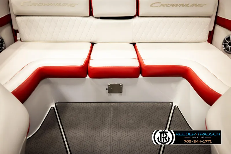 Slide: The Image of Interior seating of 2022 Crownline 220 LPX boat with red and white upholstery. - 42