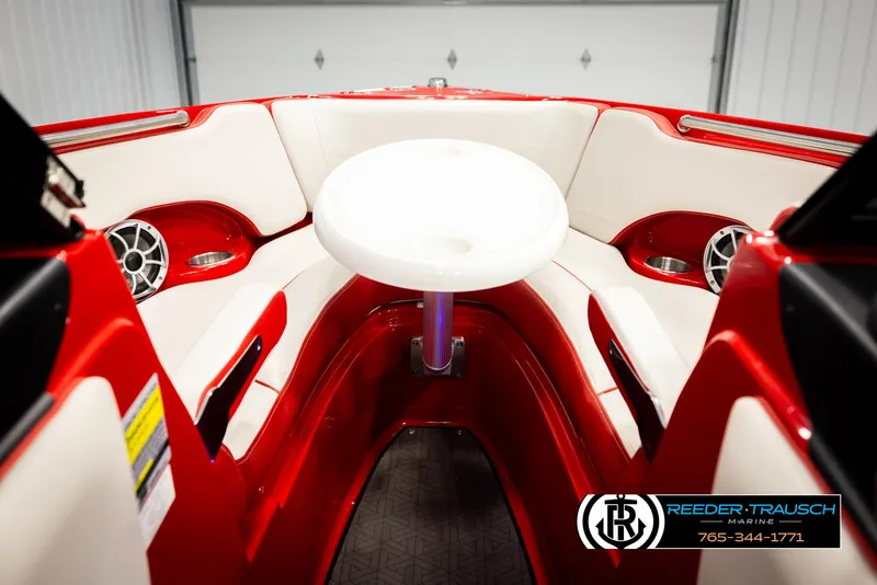 Slide: The Image of Interior of 2022 Crownline 220 LPX boat with red and white seating. - 45