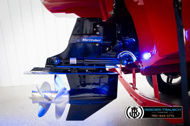 Slide: The Image of Crownline 220 LPX 2022 boat with MerCruiser engine and illuminated propeller. - 49