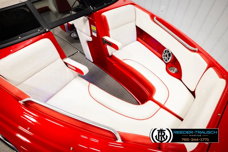 Slide: The Image of 2022 Crownline 220 LPX boat interior with red and white seating, sleek design. - 9