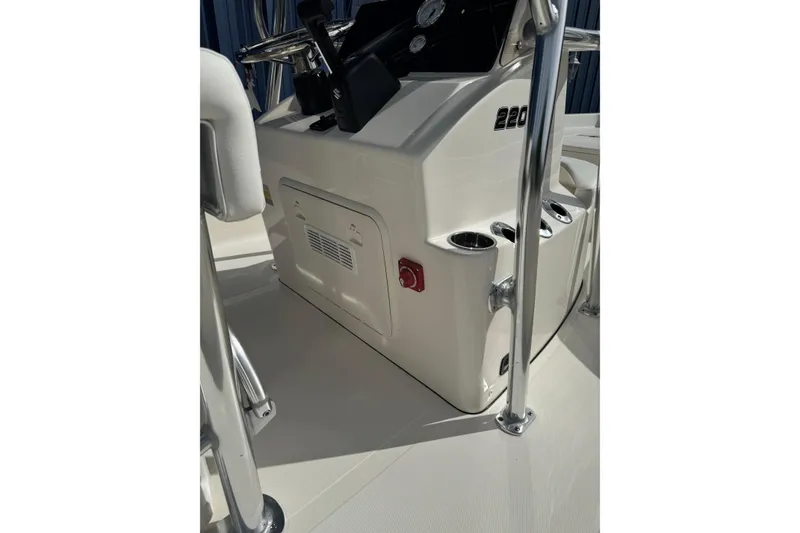 Slide: The Image of 2026 Bulls Bay 2200 boat console with steering wheel and controls. - 5