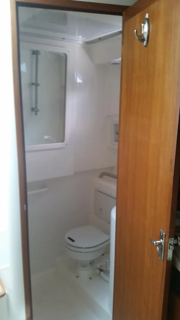 Slide: The Image of Bathroom in 1998 Cabo 31 Express boat. - 22