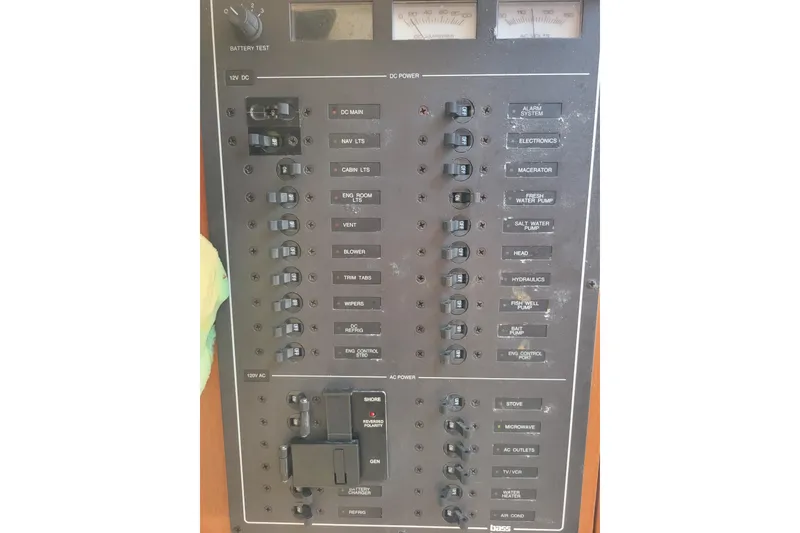 Slide: The Image of Electrical control panel of a 1998 Cabo 31 Express with Tower boat. - 24