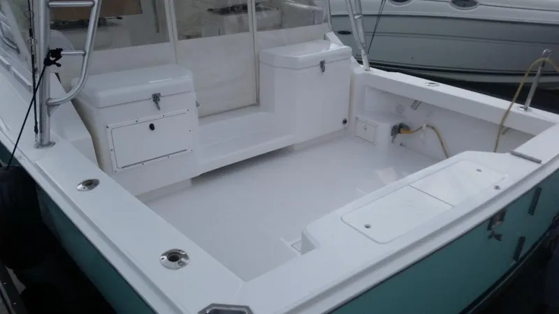 Slide: The Image of 1998 Cabo 31 Express boat with tower, spacious deck. - 26