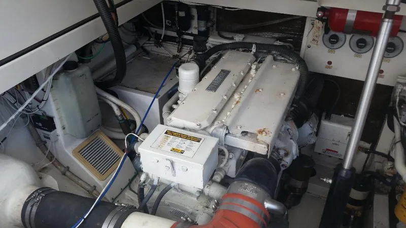 Slide: The Image of 1998 Cabo 31 Express engine compartment view. - 31