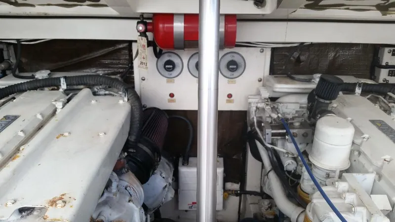 Slide: The Image of Engine room of a 1998 Cabo 31 Express with Tower. - 32