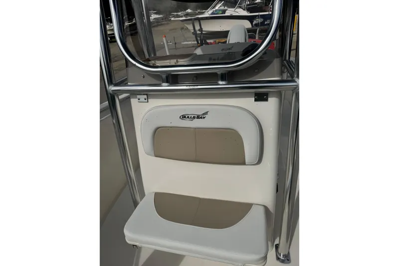 Slide: The Image of 2026 Bulls Bay 230 CC boat seat with logo and stainless steel frame. - 9