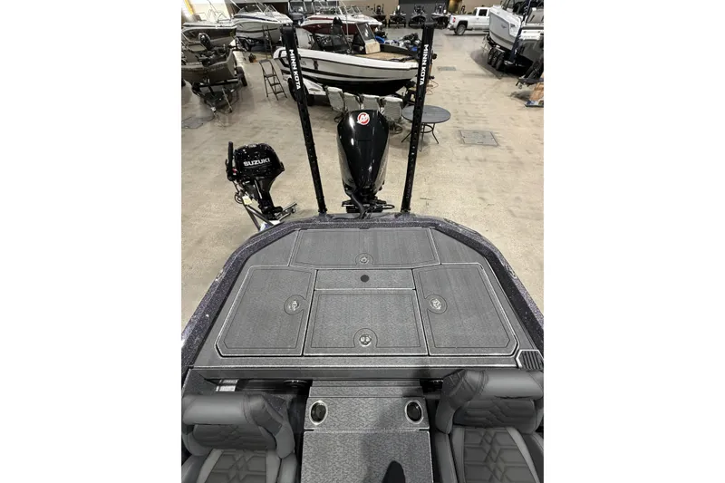 Slide: The Image of 2026 Vexus boat interior with Suzuki motor, featuring storage compartments and seating. - 8