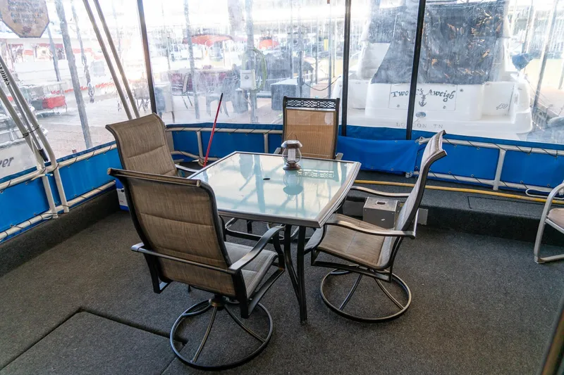Slide: The Image of Outdoor seating area on 1996 Lakeview 66 x 16 Widebody Houseboat. - 16