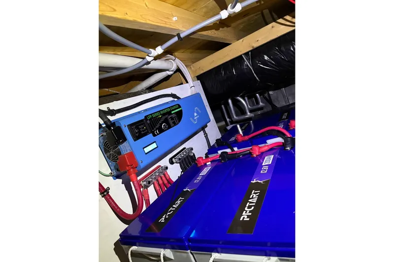 Slide: The Image of Electrical system of a 1996 Lakeview 66 x 16 Widebody Houseboat with inverter and batteries. - 82