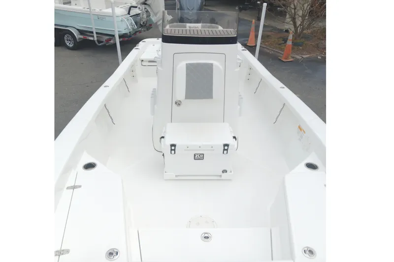 Slide: The Image of 2026 BlackJack 256 Bay boat interior with white deck and storage compartments. - 10