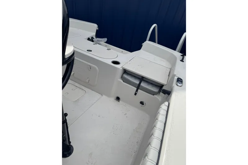 Slide: The Image of 2026 Carolina Skiff 21 LS boat interior with seating and storage compartments. - 8