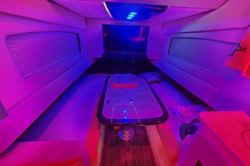 Slide: The Image of Luxurious interior of 2021 Scout 420 LXF yacht with vibrant LED lighting. - 20