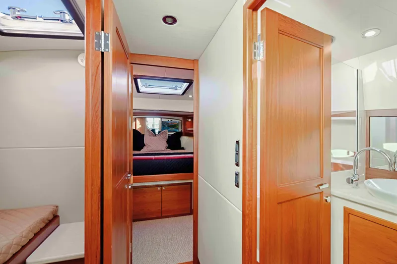 Slide: The Image of Luxurious interior of 2015 Palm Beach Motor Yachts PB45, featuring wood finishes and modern amenities. - 53