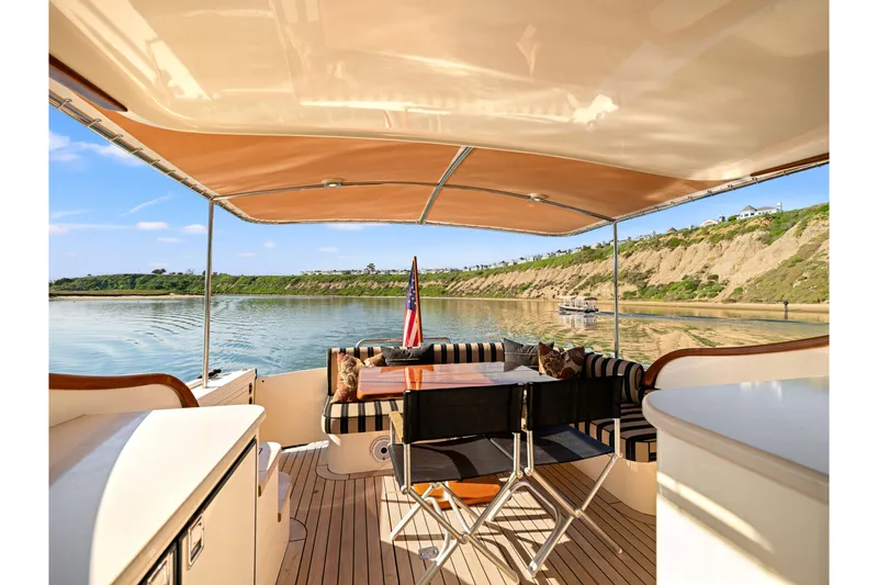 Slide: The Image of Luxurious 2015 Palm Beach Motor Yachts PB45 interior with scenic waterfront view. - 25