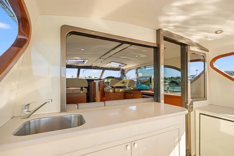 Slide: The Image of Luxurious interior of 2015 Palm Beach Motor Yachts PB45, featuring sleek design and modern amenities. - 31