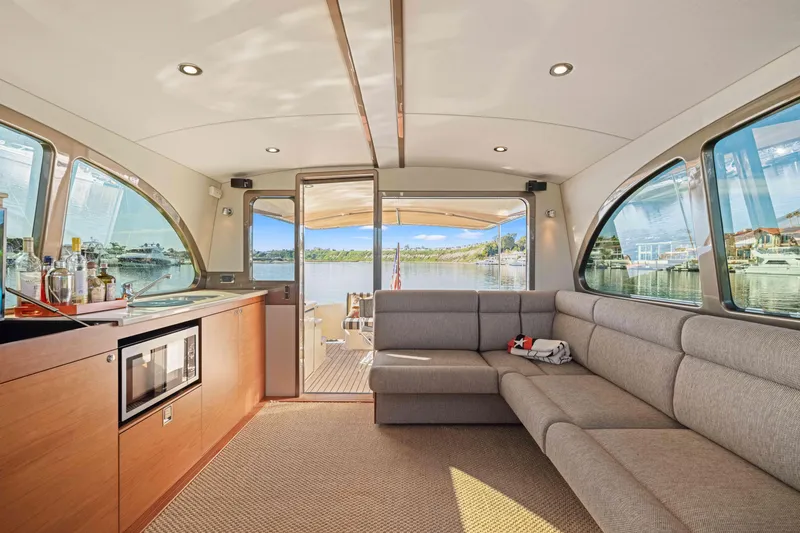 Slide: The Image of Luxurious interior of 2015 Palm Beach Motor Yachts PB45 with scenic water view. - 34