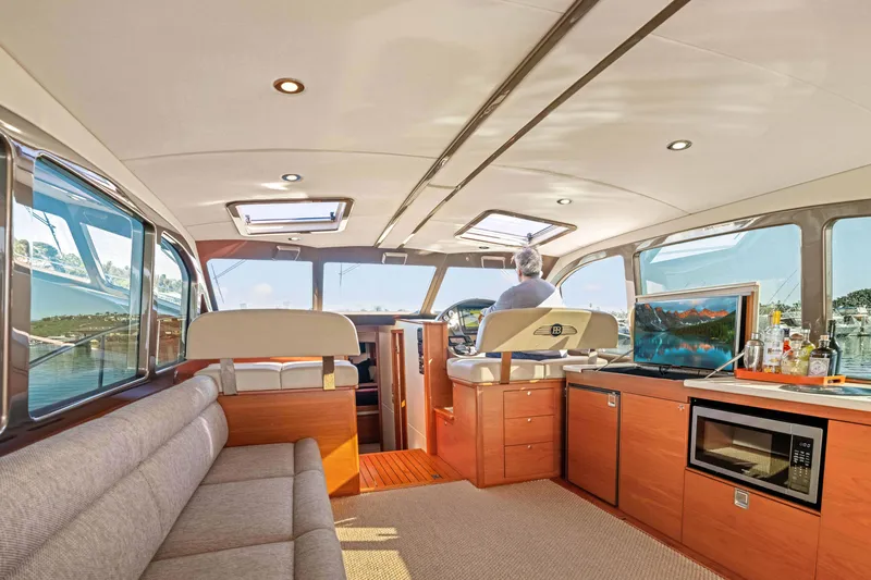 Slide: The Image of Luxurious interior of 2015 Palm Beach Motor Yachts PB45 with modern amenities and scenic views. - 39