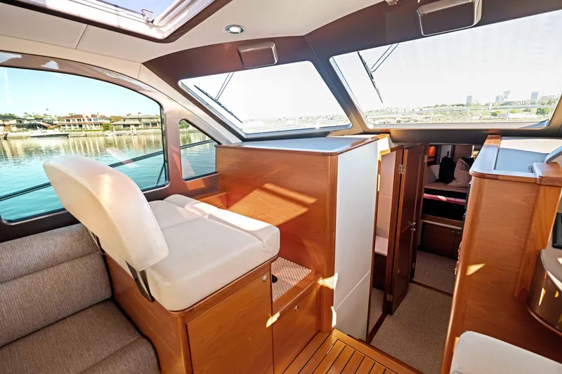 Slide: The Image of Luxurious interior of 2015 Palm Beach Motor Yachts PB45 with elegant wood finish. - 41