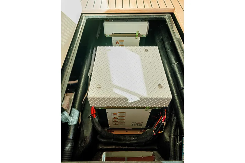 Slide: The Image of Engine compartment of 2015 Palm Beach Motor Yachts PB45, showcasing mechanical components. - 61