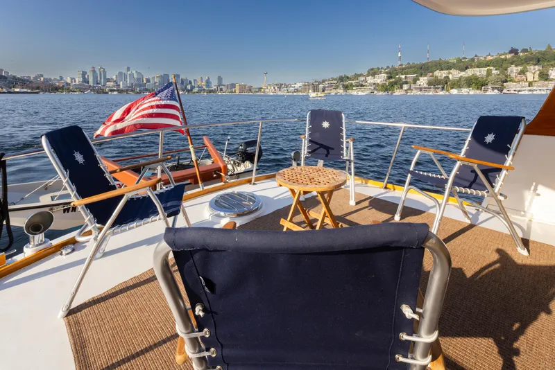 Slide: The Image of Deck of a 1965 Stephens Flushdeck with city view. - 13