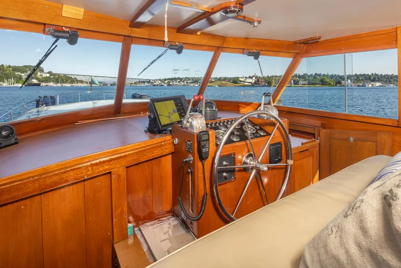 Slide: The Image of Interior of a 1965 Stephens Flushdeck boat with wooden paneling. - 18