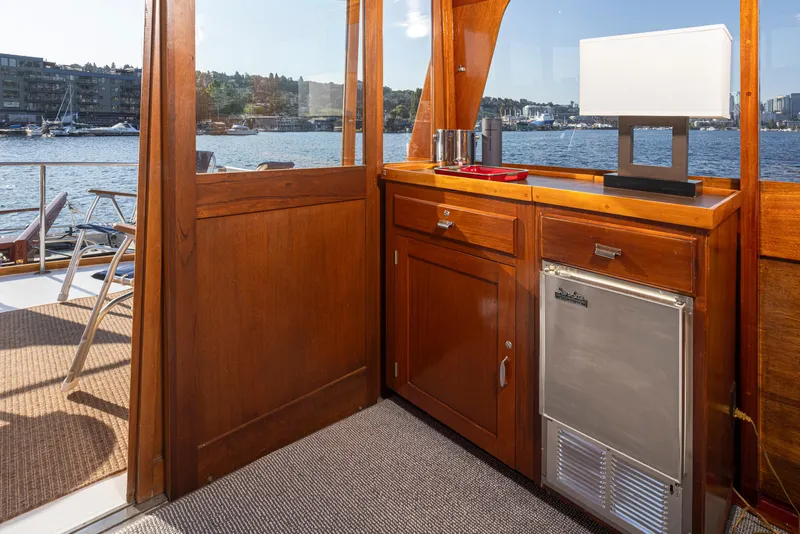 Slide: The Image of Interior of a 1965 Stephens Flushdeck yacht with wooden furnishings. - 21