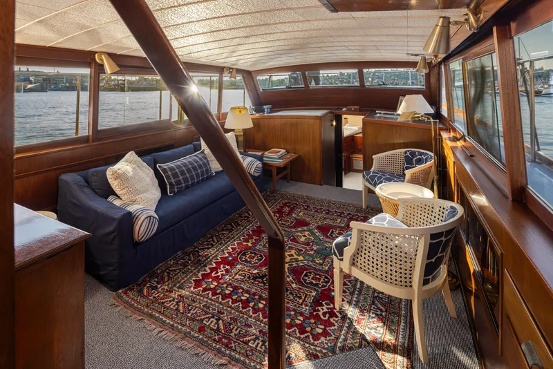 Slide: The Image of Interior of a 1965 Stephens Flushdeck yacht with cozy furnishings. - 22